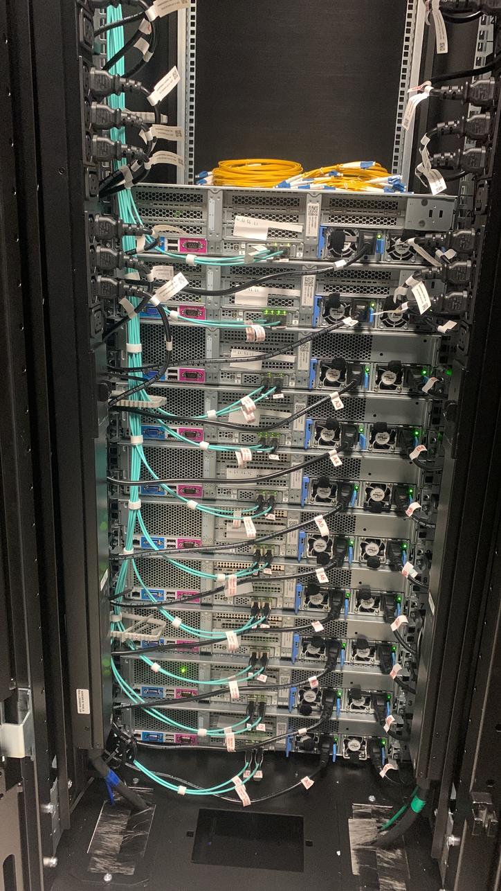 Rear of a server rack with dressed power and network cabling